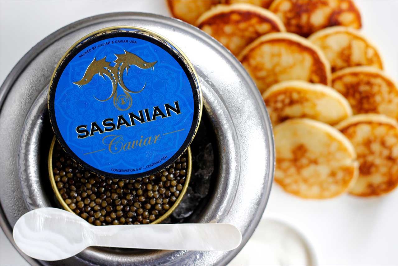 Lobster-Bar-Sea-Grille-lobster-Sasanian Caviar with spoon and pancakes
